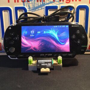 Sony PSP 1001 with Charger, Memory Stick, & Games